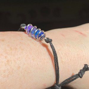 Bi Pride Aura Quartz point wrapped in Stainless steel wire on  Adjustable Cord
